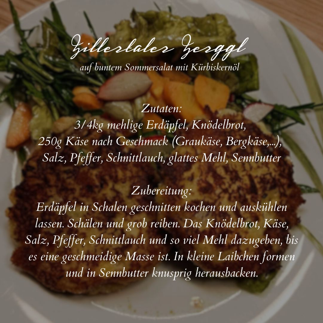 Kaspressknödel mit Salat und Erdäpfeln auf weißem Teller
